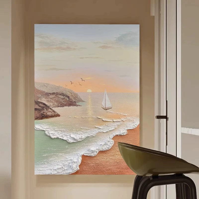 Coastal wall art shown beside a dining space
