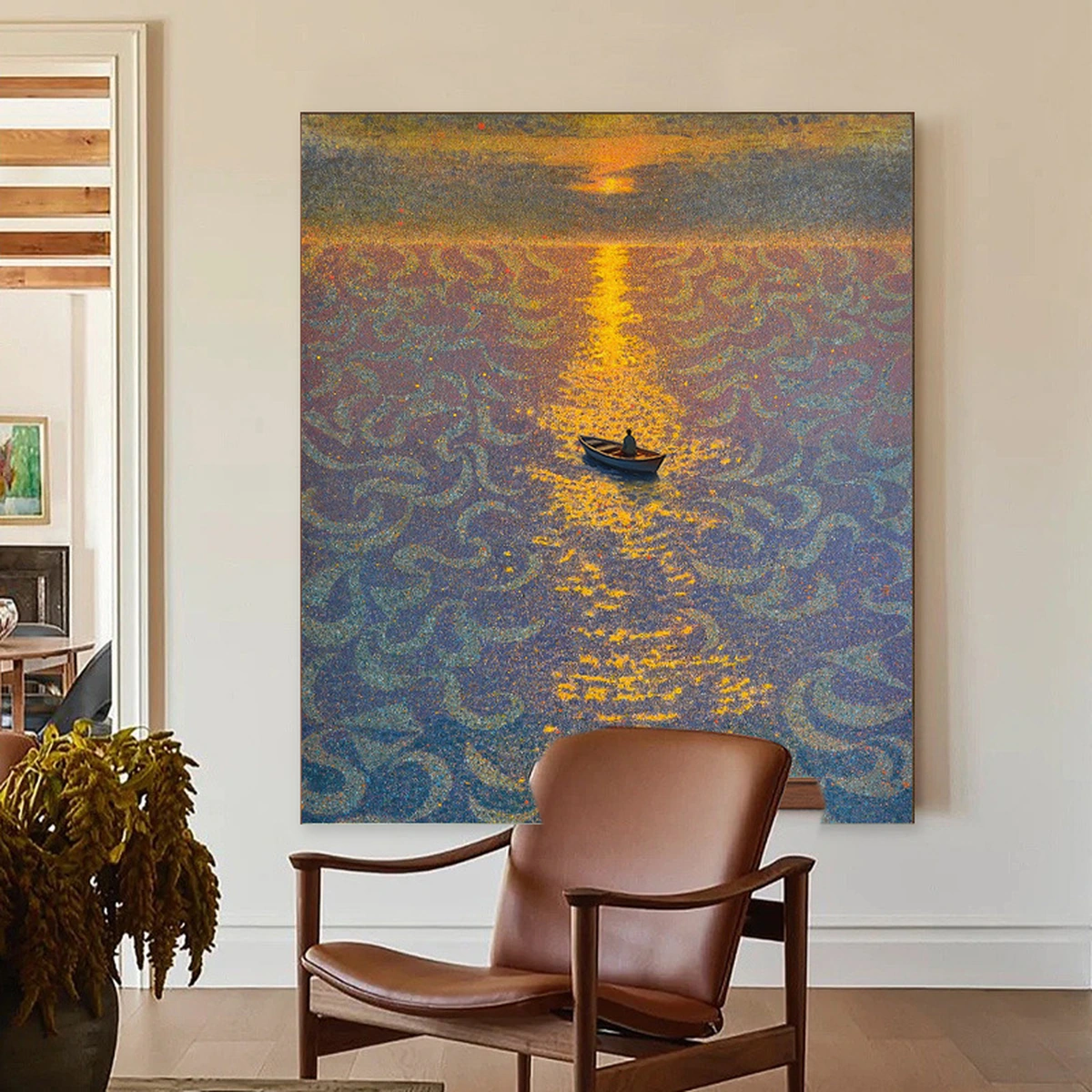 Eastern Haze landscape painting displayed unframed beside a reading chair