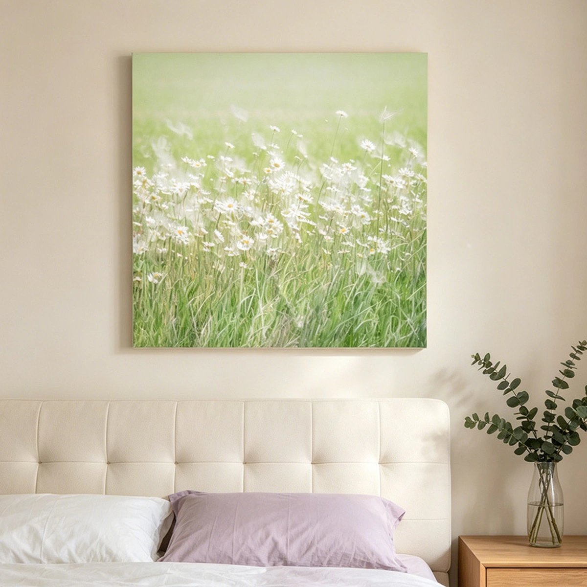 Meadow Whisper green daisy painting displayed unframed above a bed