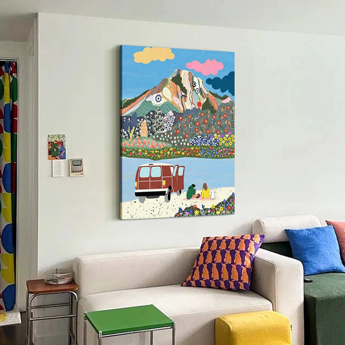 Picnic Rhythm colourful abstract oil painting displayed unframed above a contemporary sofa