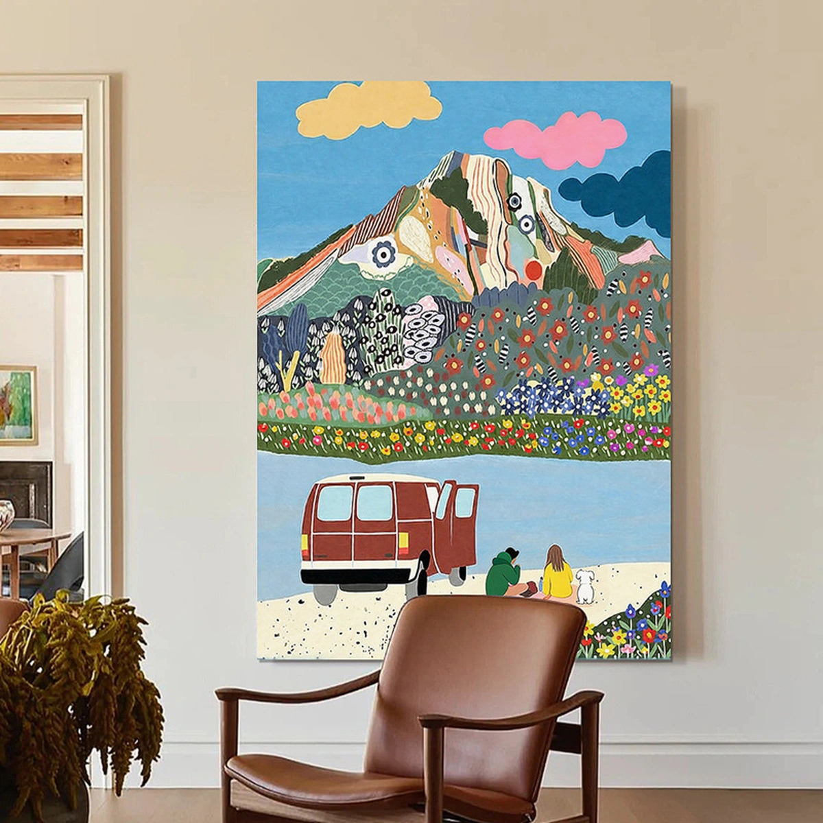 Picnic Rhythm colourful abstract oil painting displayed unframed beside a brown reading chair