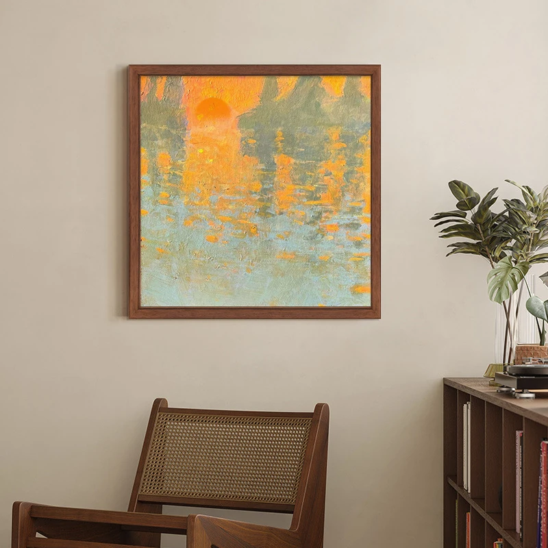 Textured sunrise waterscape artwork in a neutral interior